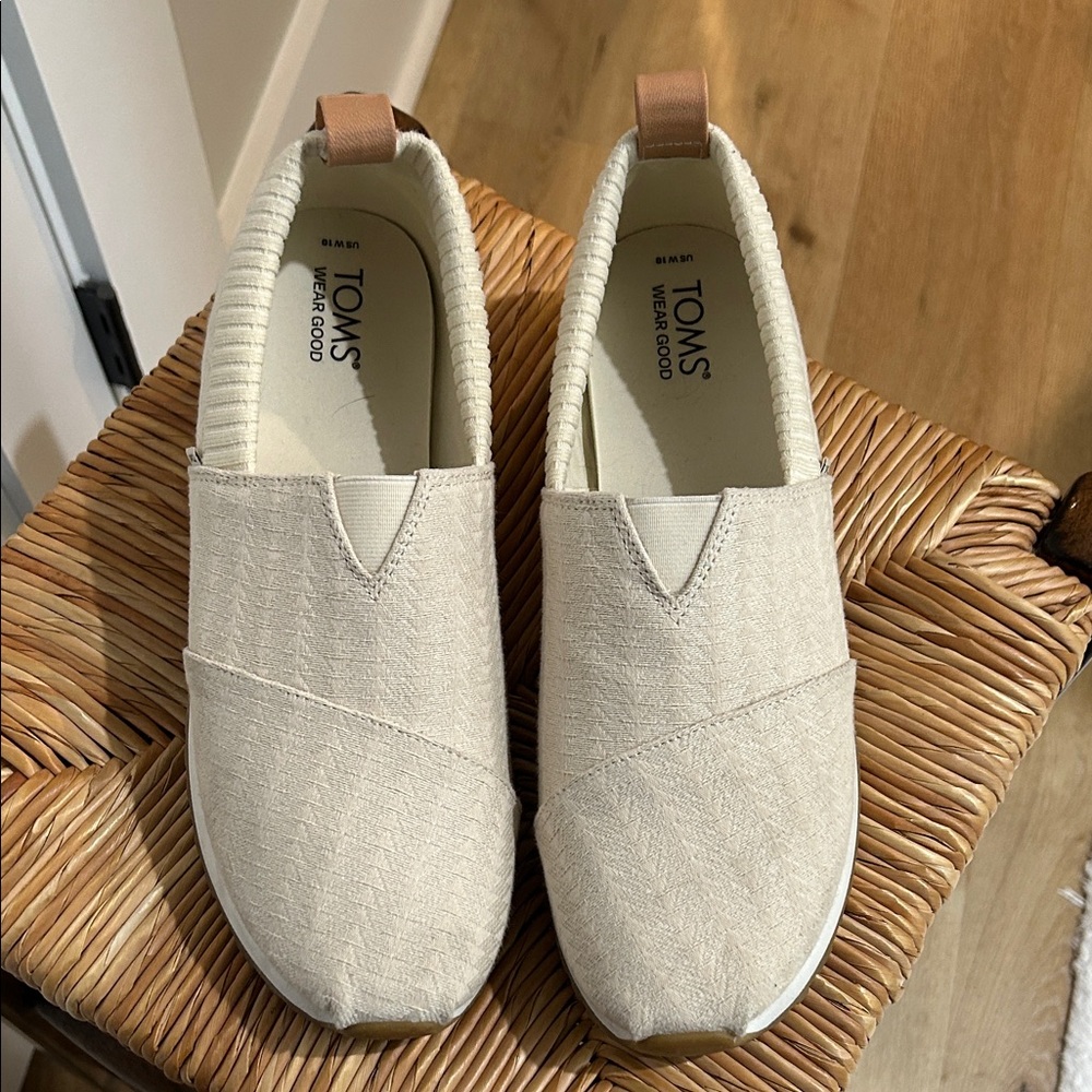 TOMS Cream Canvas Slip-Ons
